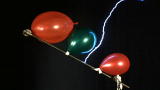 Time Warp: Tesla Coil vs Balloon