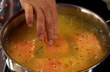 Emeril Green: Poached Salmon with Herbed Tomato